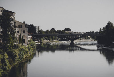 Bridge over river against clear sky