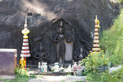 View of buddha statue in front of temple