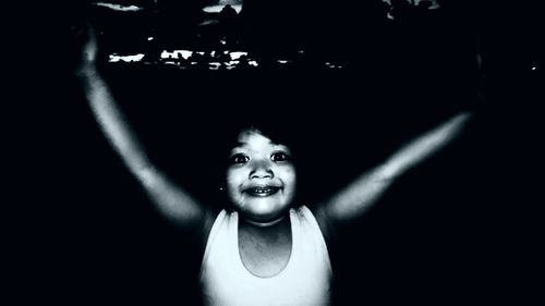 Portrait of cute girl in the dark