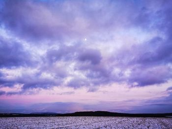 Scenic view of sea against dramatic sky