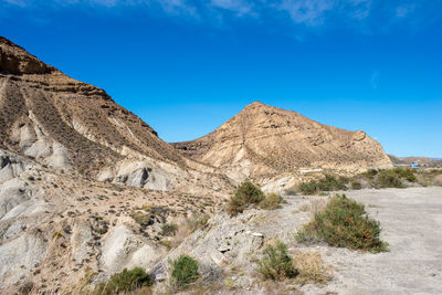 Scenic view of rocky mountains against sky