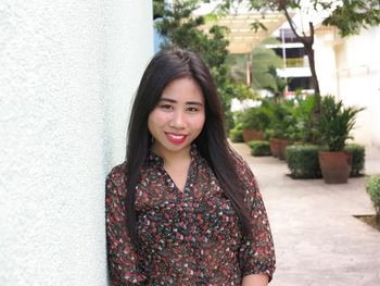 Portrait of smiling young woman