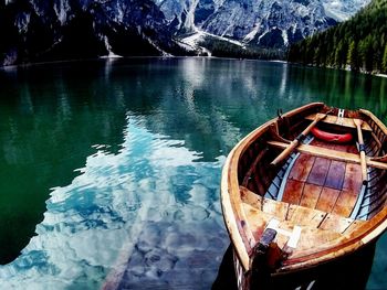 Boats moored in river