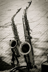 Saxophones on footpath