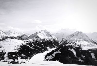 Snow capped rocky mountains against the sky