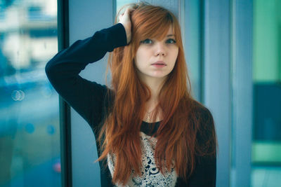 Close-up of young woman standing outdoors