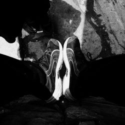 Low section of woman standing in water