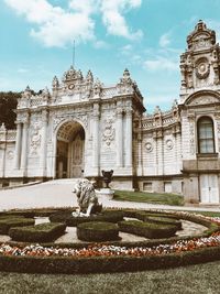 Statue in front of historical building