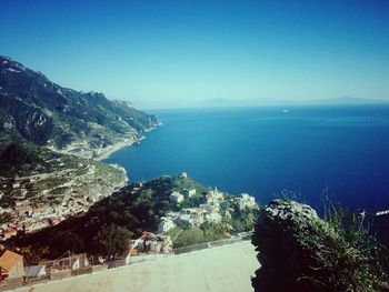 Scenic view of sea against blue sky