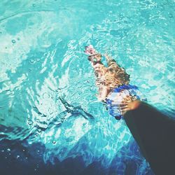 Man swimming in pool