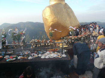 Group of people outside temple