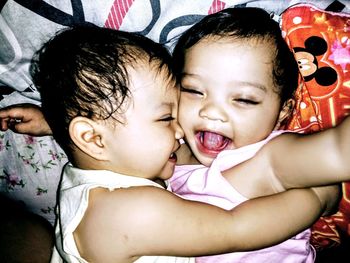 High angle view of babies on bed