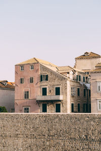 Low angle view of old building against clear sky