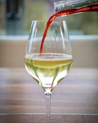 Close-up of wineglass on table