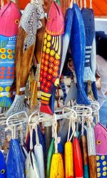 Close-up of clothes hanging for sale in market