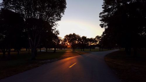 Empty road at sunset