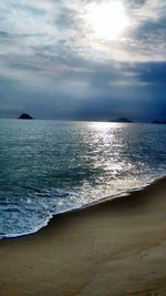 Scenic view of sea against dramatic sky