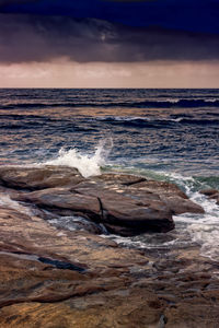 Scenic view of sea against sky during sunset