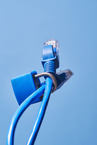 Close-up of cable against clear blue sky