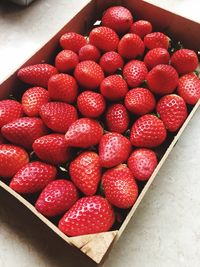 High angle view of strawberries on table