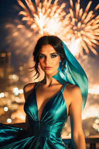 Portrait of young woman standing against sky