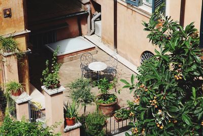 High angle view of table and chair on balcony