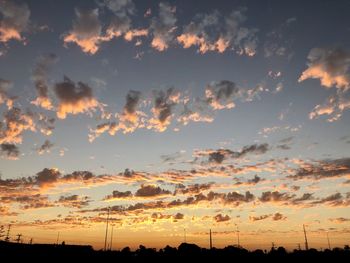 Low angle view of dramatic sky during sunset