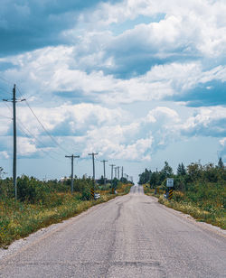 Empty road against sky