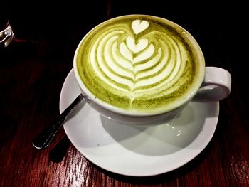 Close-up of cappuccino on table