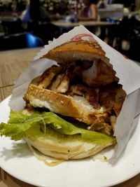 Close-up of burger in plate on table