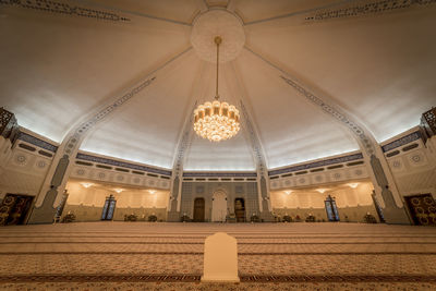 Low angle view of illuminated ceiling of building