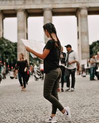 People walking on street in city