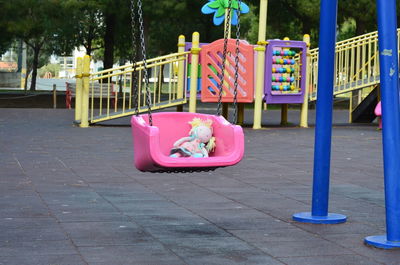 High angle view of toy car on footpath at park