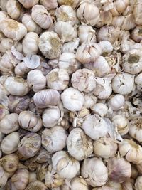 Full frame shot of onions for sale in market