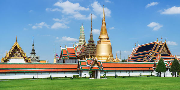 View of temple against building