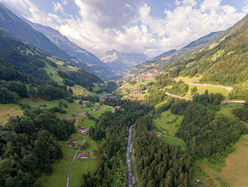 Scenic view of landscape and mountains against sky