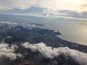 Aerial view of volcanic landscape against sky