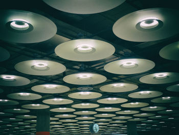 Low angle view of illuminated ceiling