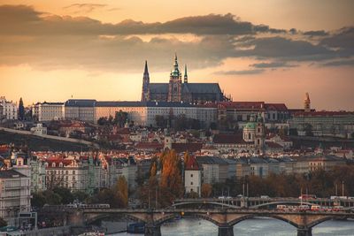 Sunset over prague, view of city and river 
