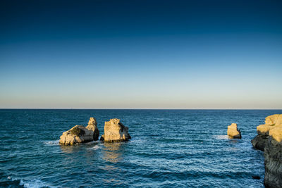 Scenic view of sea against clear sky