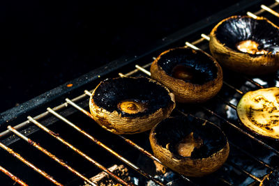 High angle view of meat on barbecue