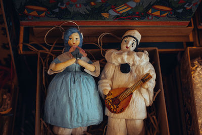Vintage toys figurines of malvina and pierrot . festive details. creative dolls souvenirs
