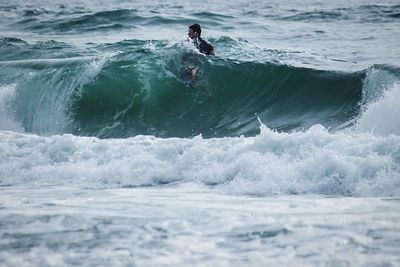 Man swimming in sea