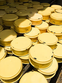 Stack of yellow containers