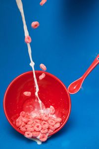 Close-up of drink against blue background