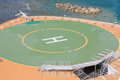 High angle view of information sign by sea