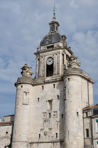 Low angle view of historic building against sky