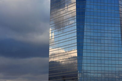 Low angle view of modern building against sky