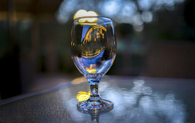 Close-up of wineglass on table