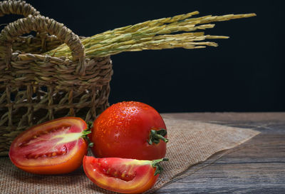 Close-up of strawberries in basket on table